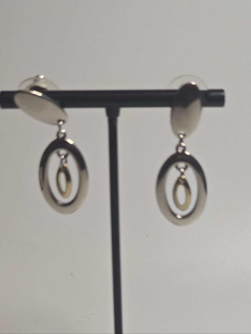 Oval Drop Earrings in Silver Tone.